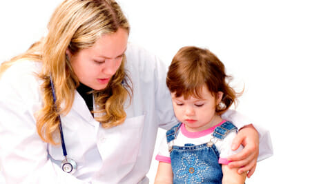 Doctor talking to a child